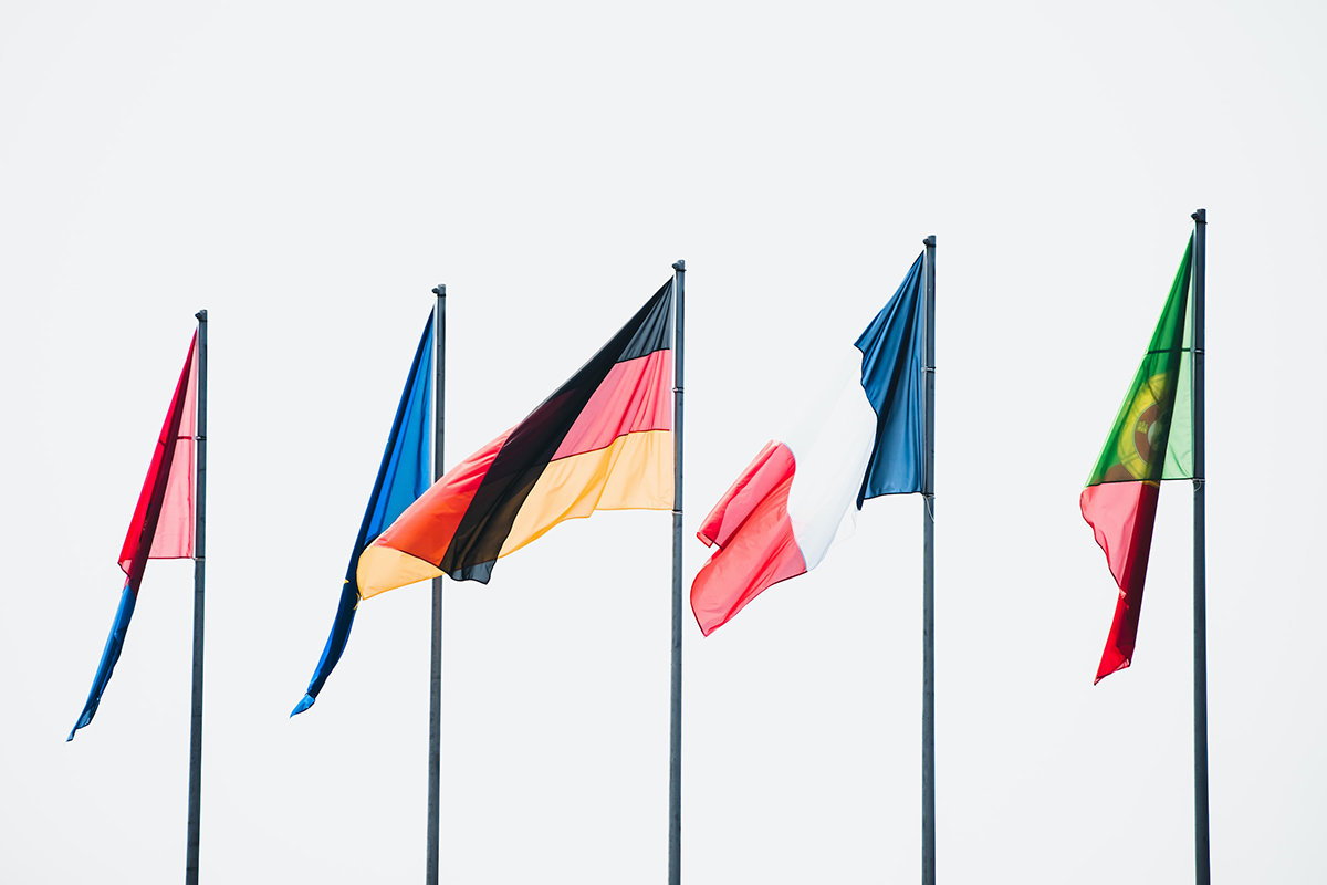 Image of international flags on flagpoles